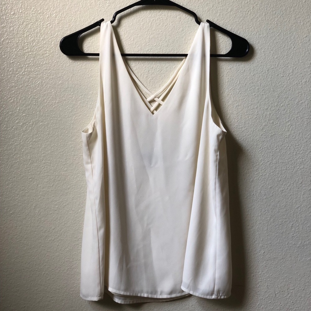 Strappy back sleeveless Express top.